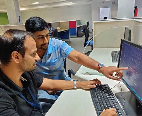 We know... soft skills matter too Two React developers discussing a web development problem